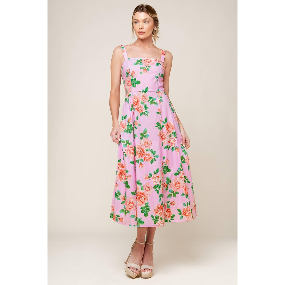 a woman in a pink dress