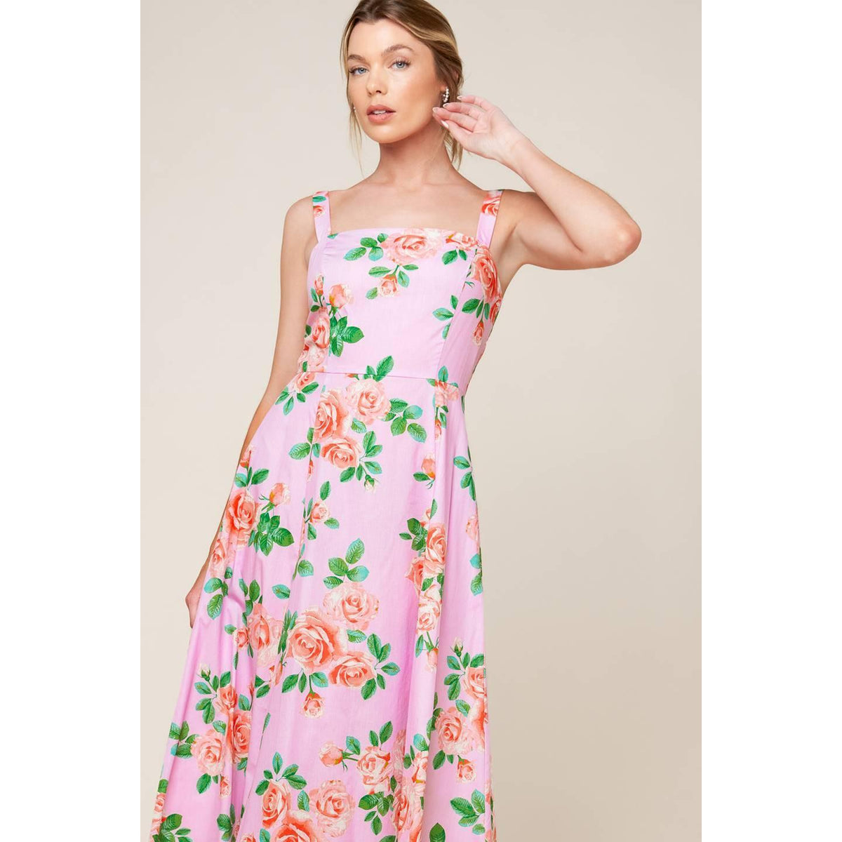 a woman in a pink dress