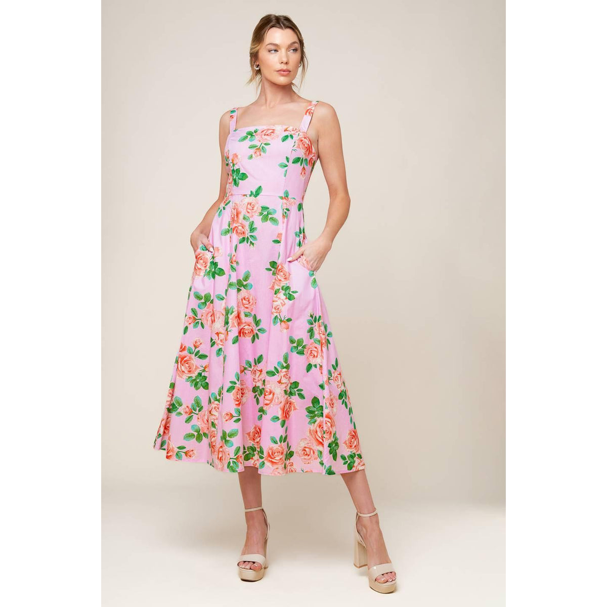 a woman in a pink dress