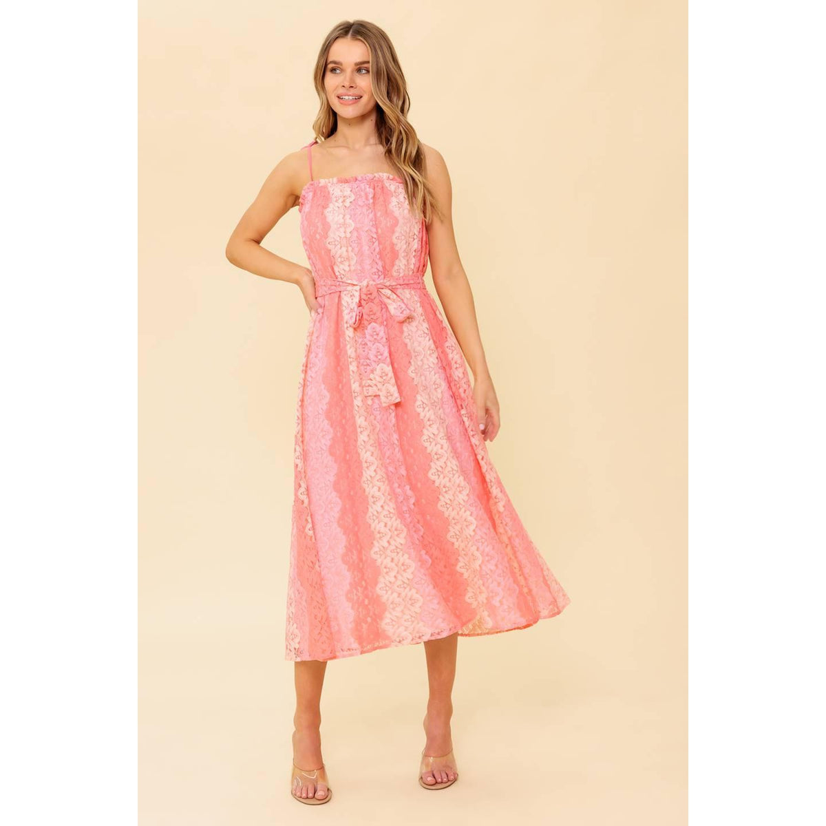 a woman in a pink dress