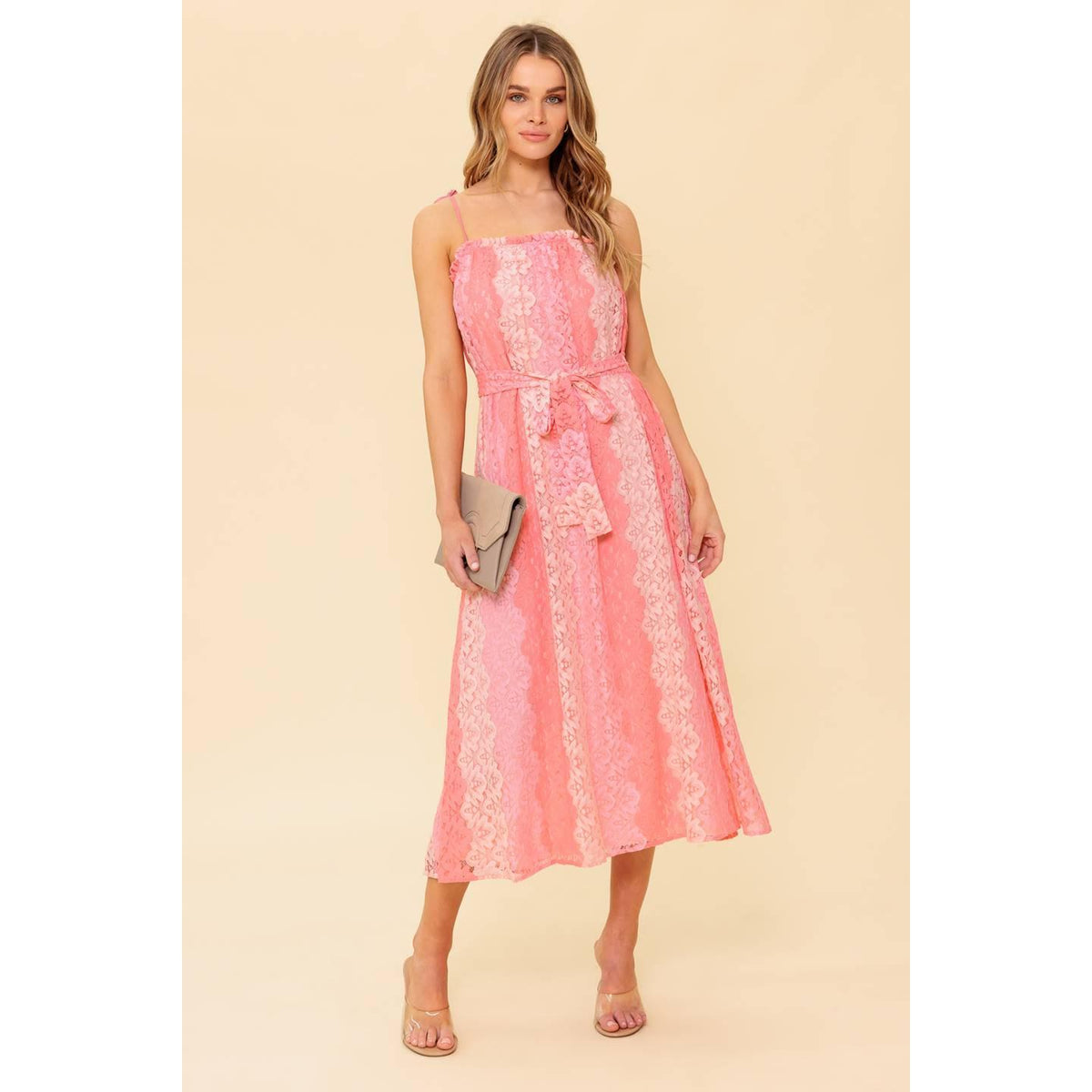 a woman in a pink dress