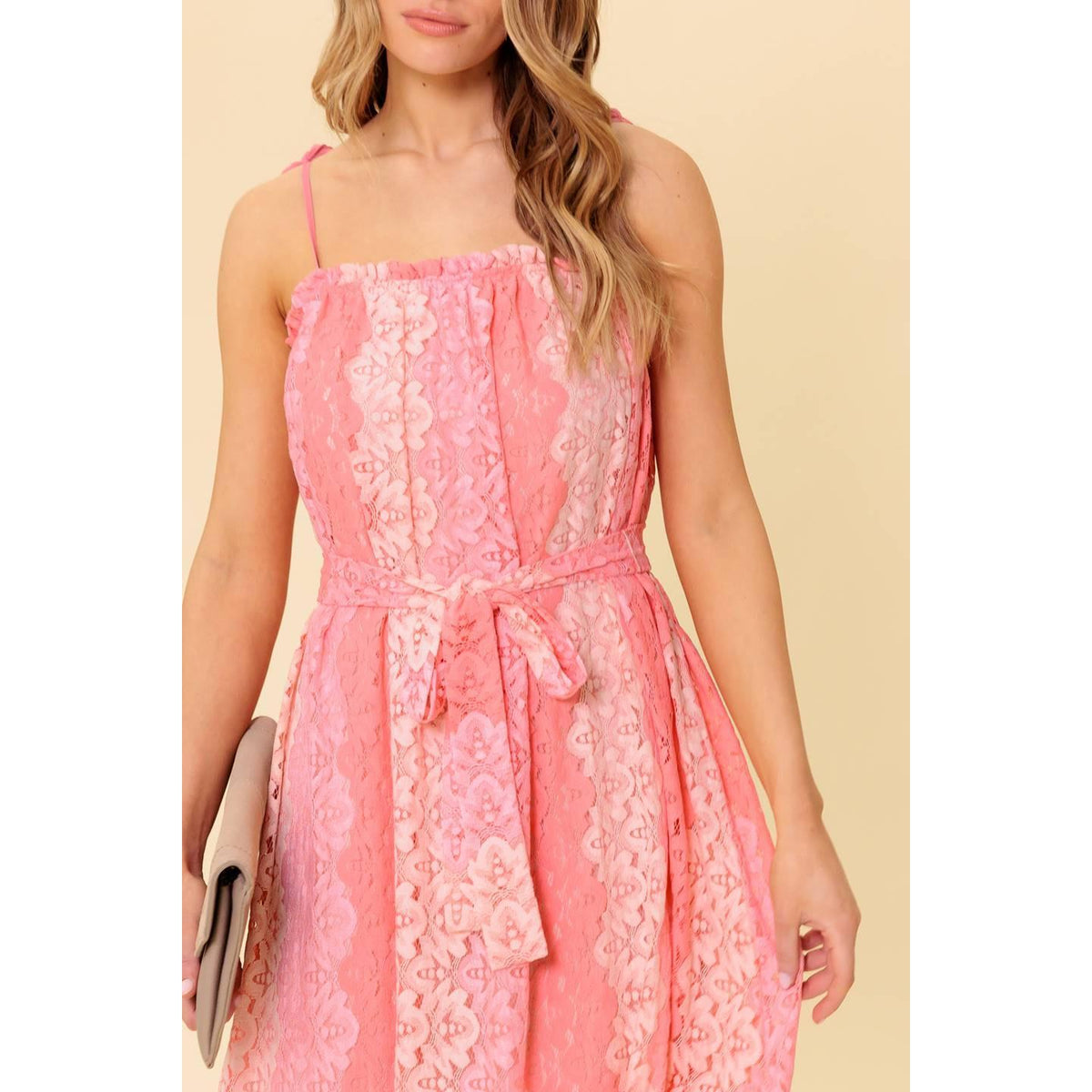a woman in a pink dress