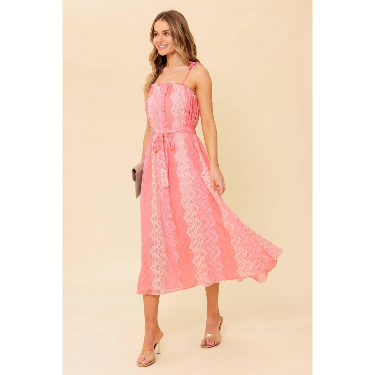 a woman in a pink dress