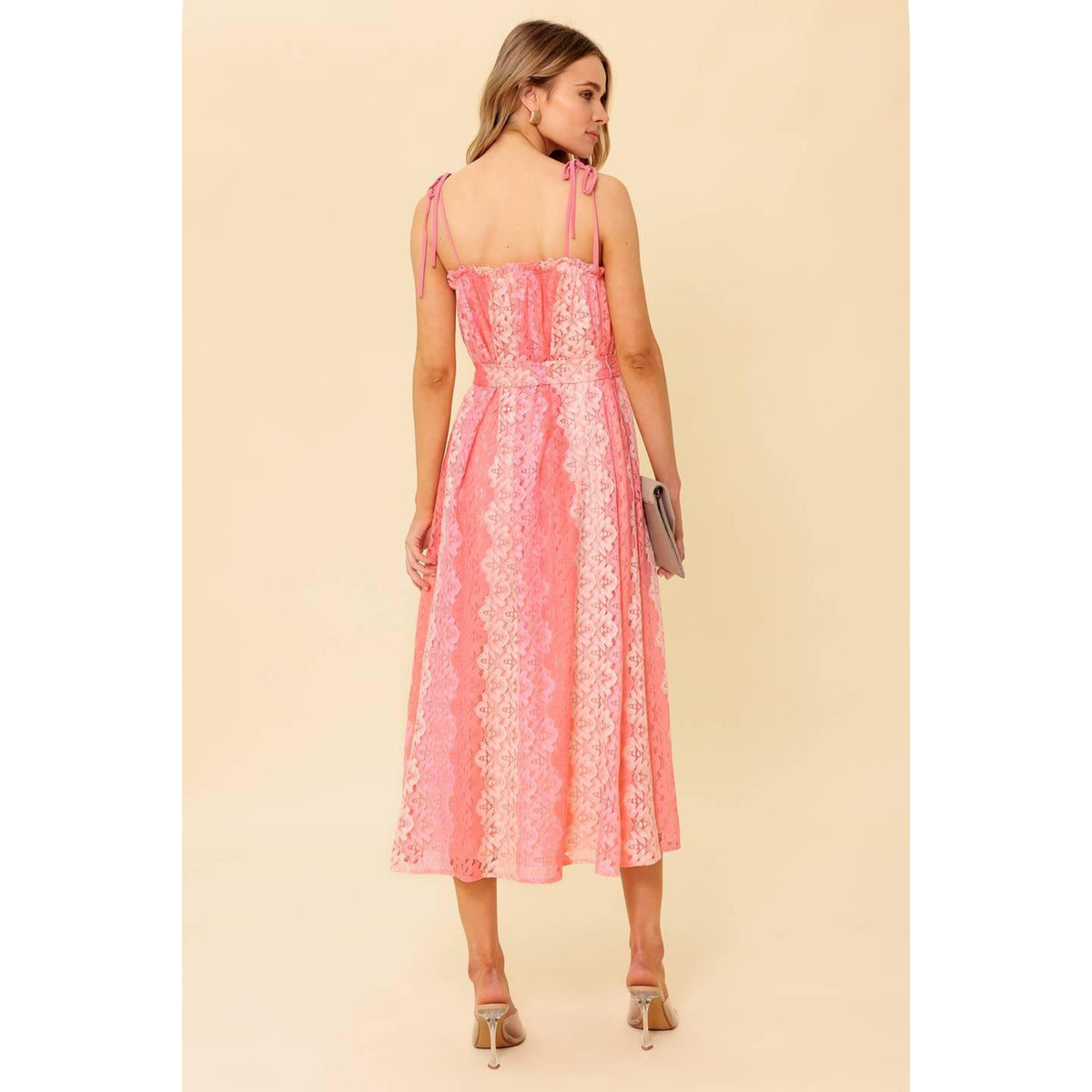 a woman in a pink dress