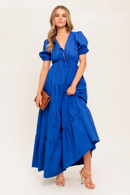 a woman in a blue dress