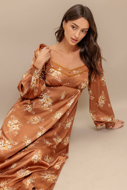 a woman in a brown dress