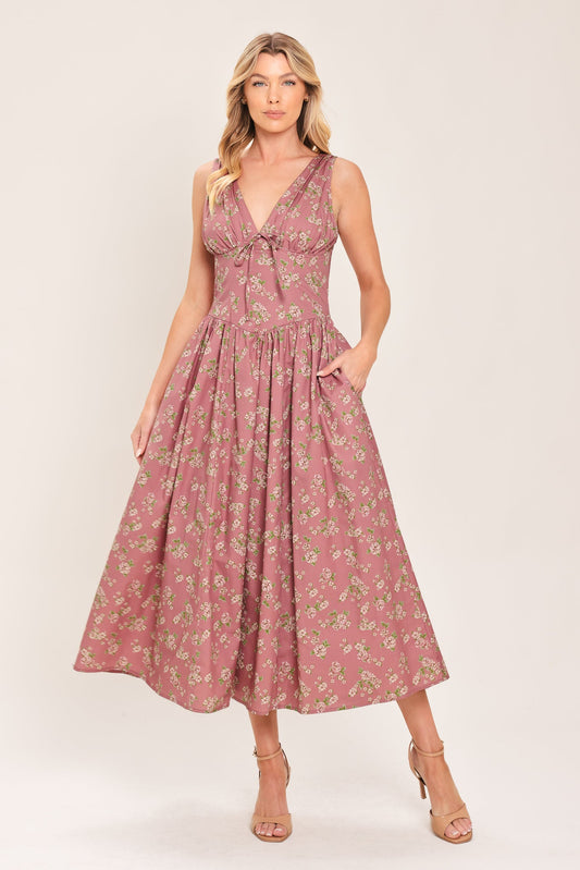 a woman in a pink dress