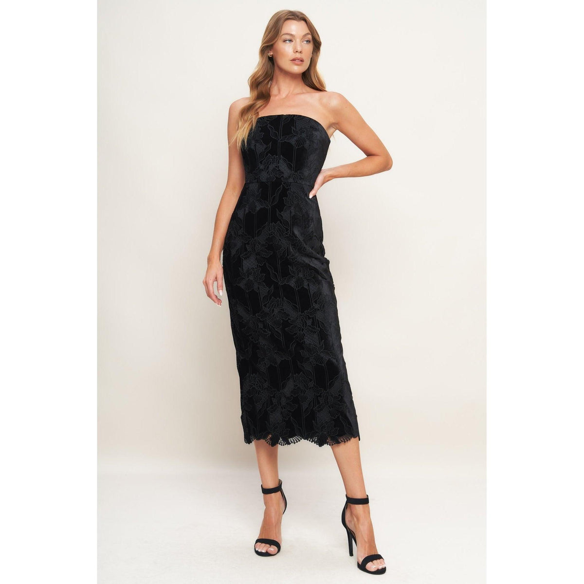 a woman in a black dress