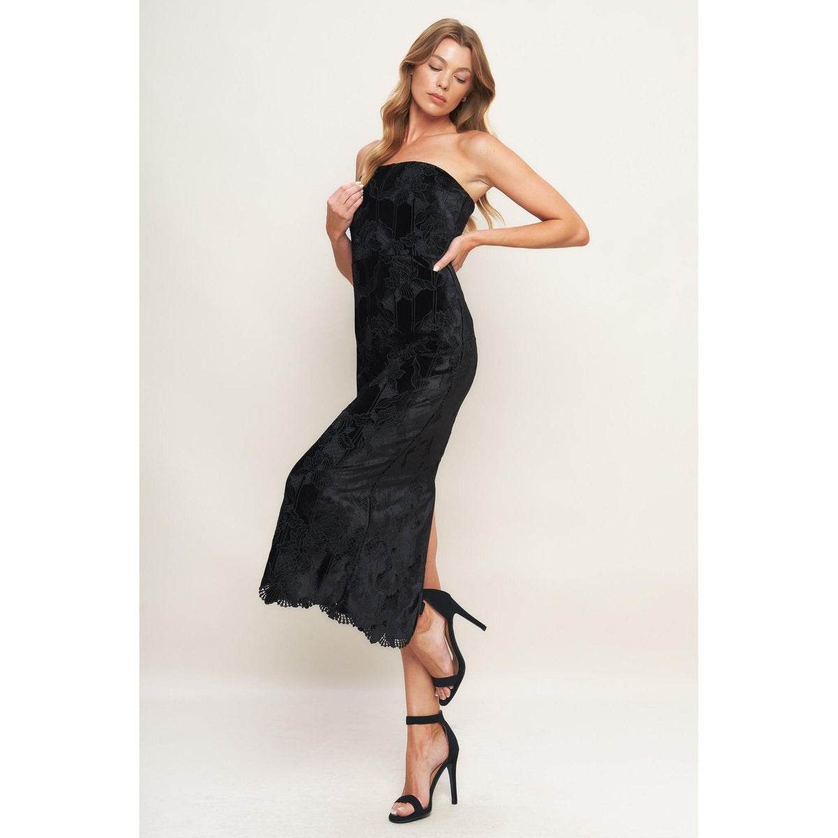 a woman in a black dress
