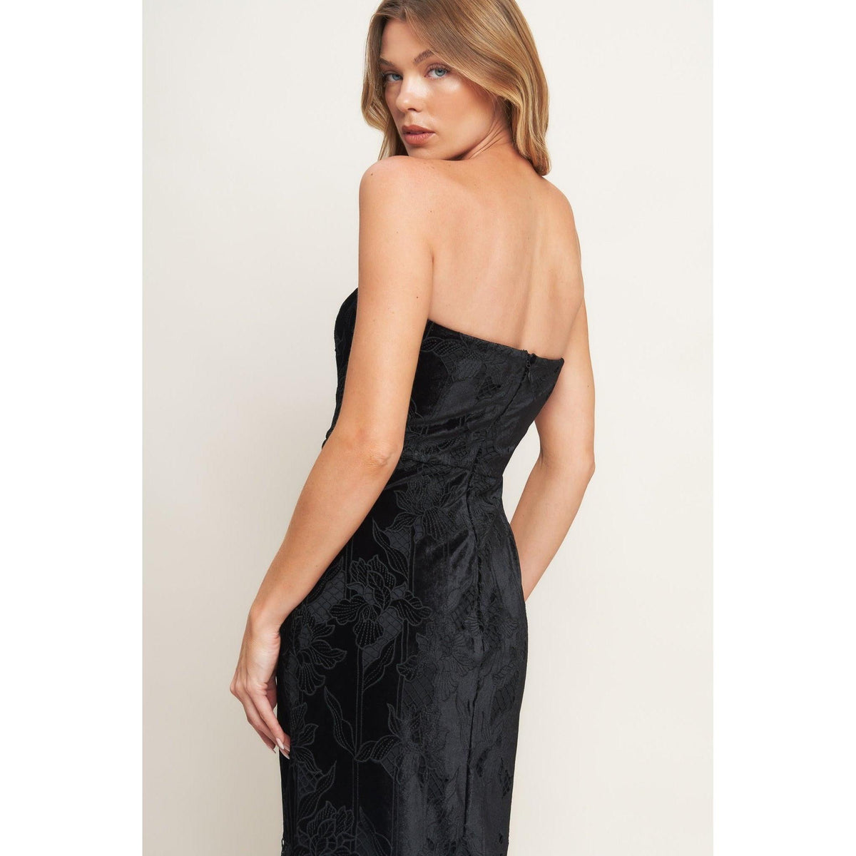 a woman in a black dress