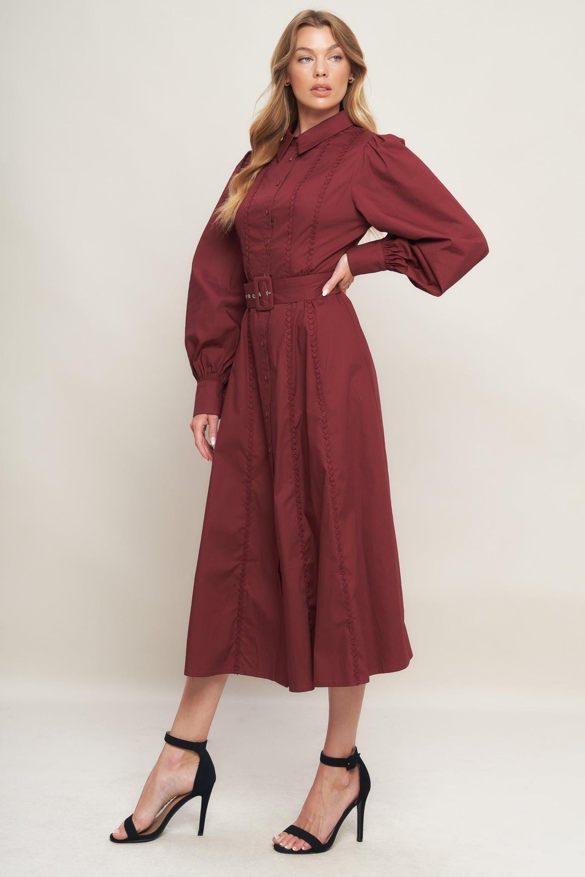 a woman in a red dress