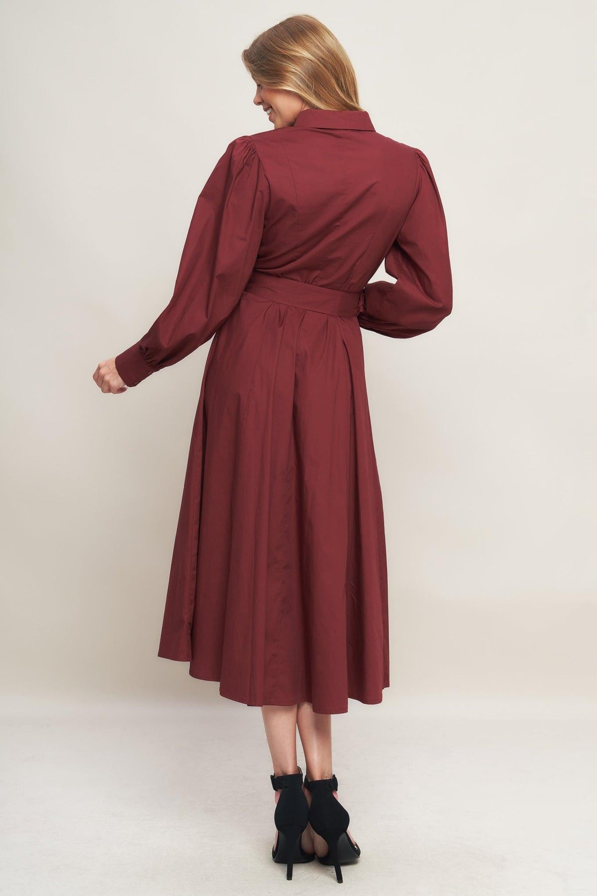 a woman in a red dress