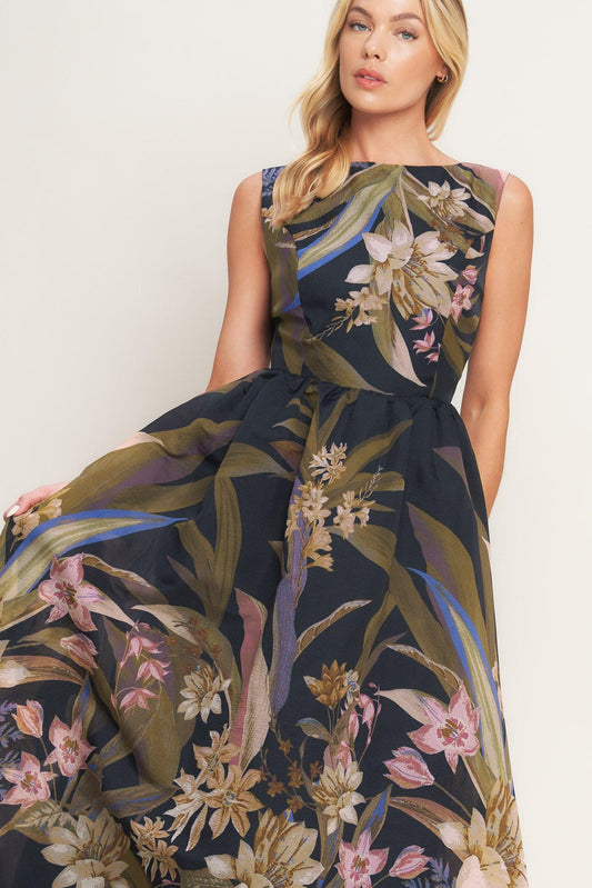 a woman in a floral dress