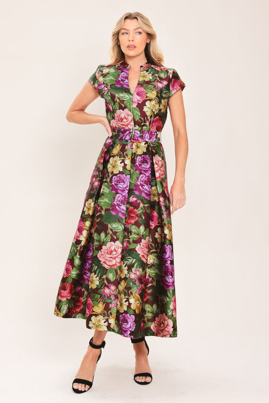 a woman in a floral dress