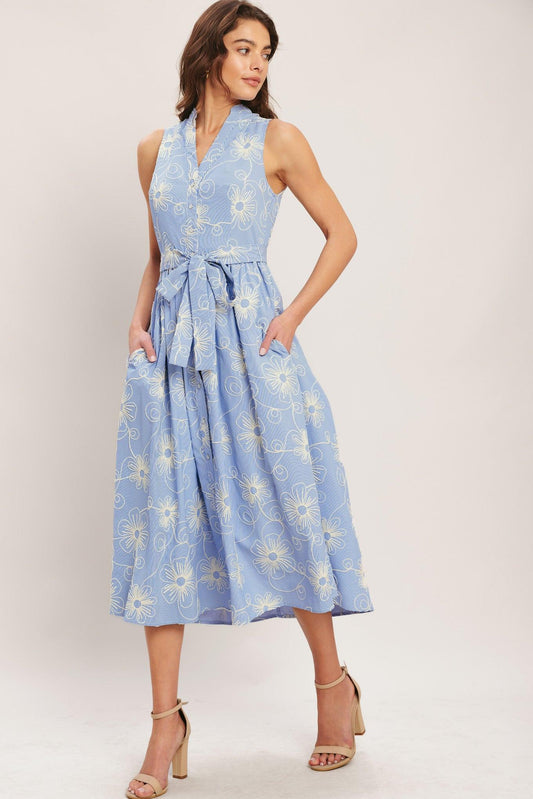a woman in a blue dress