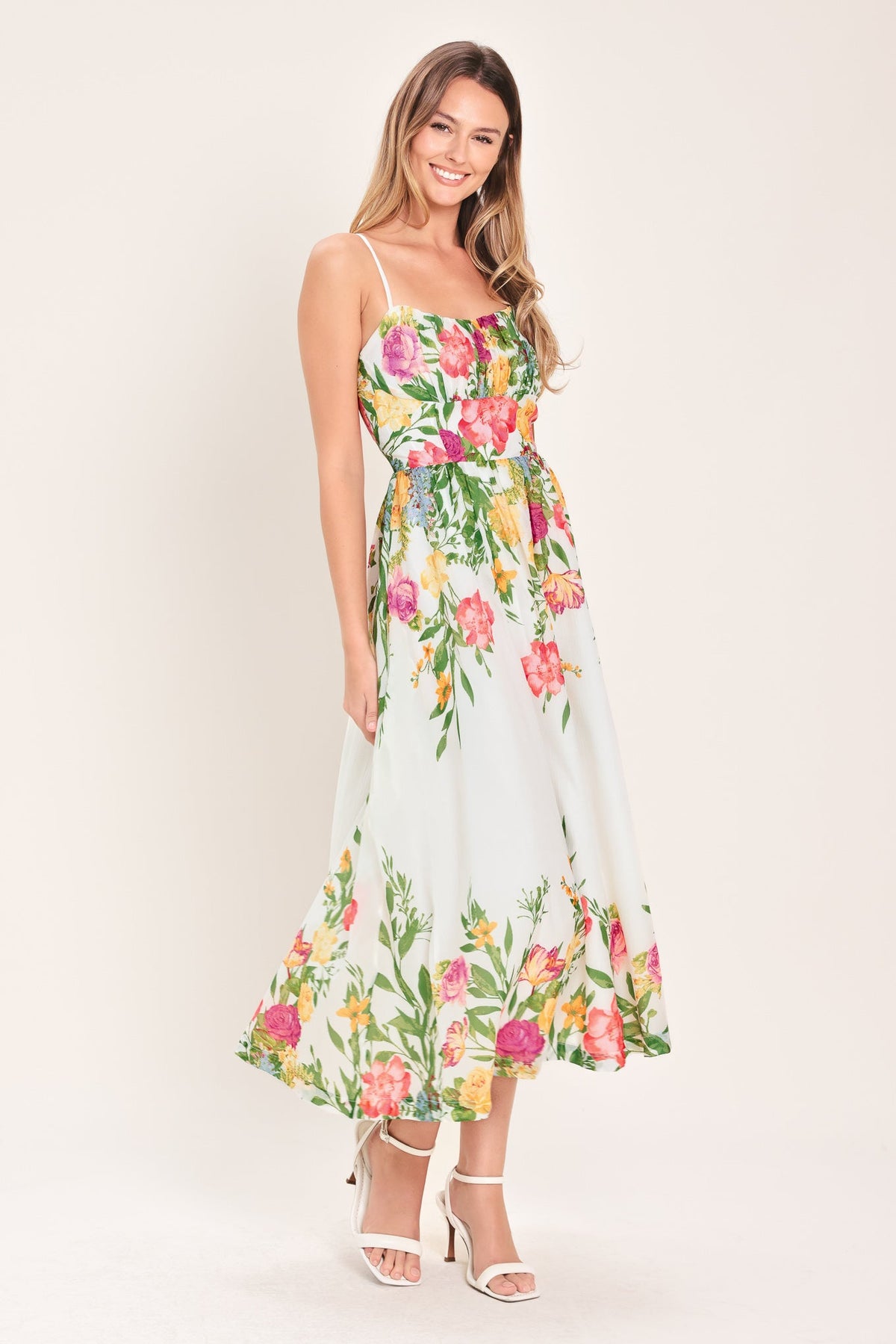 a woman in a floral dress