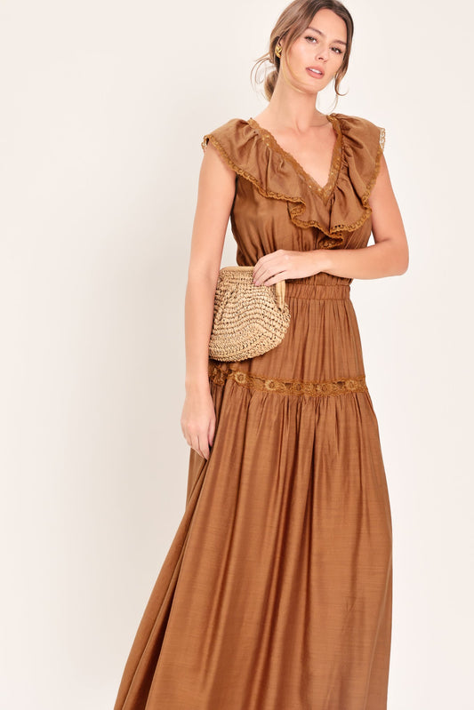 a woman in a brown dress