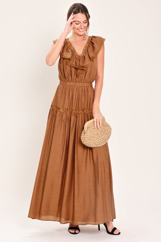 a woman in a brown dress