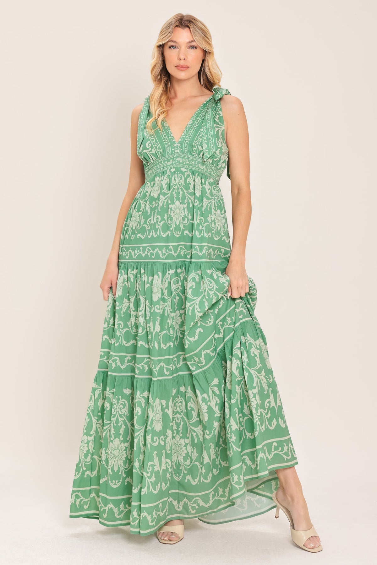 a woman in a green dress