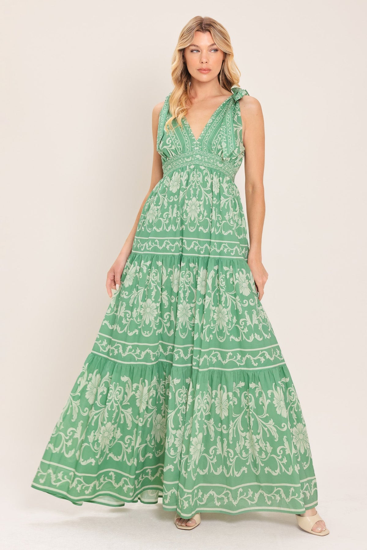 a woman in a green dress