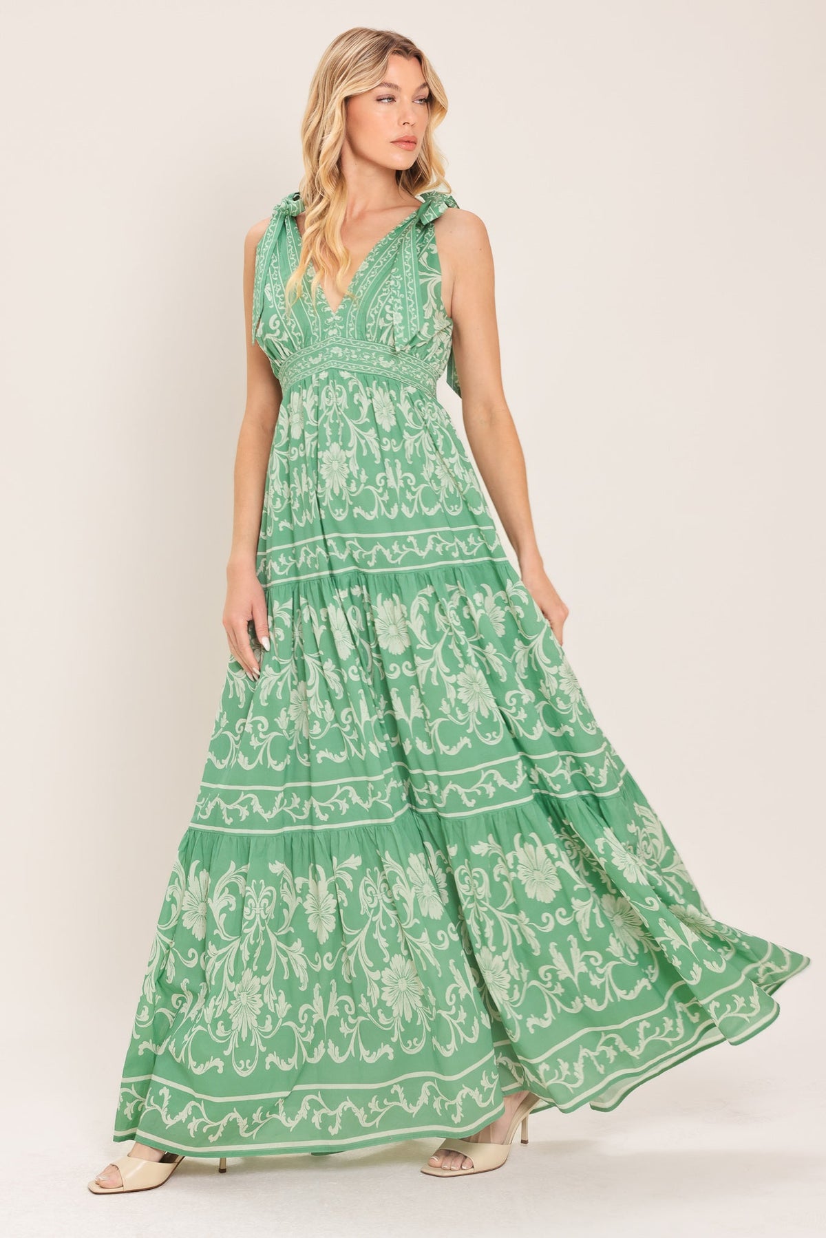 a woman in a green dress