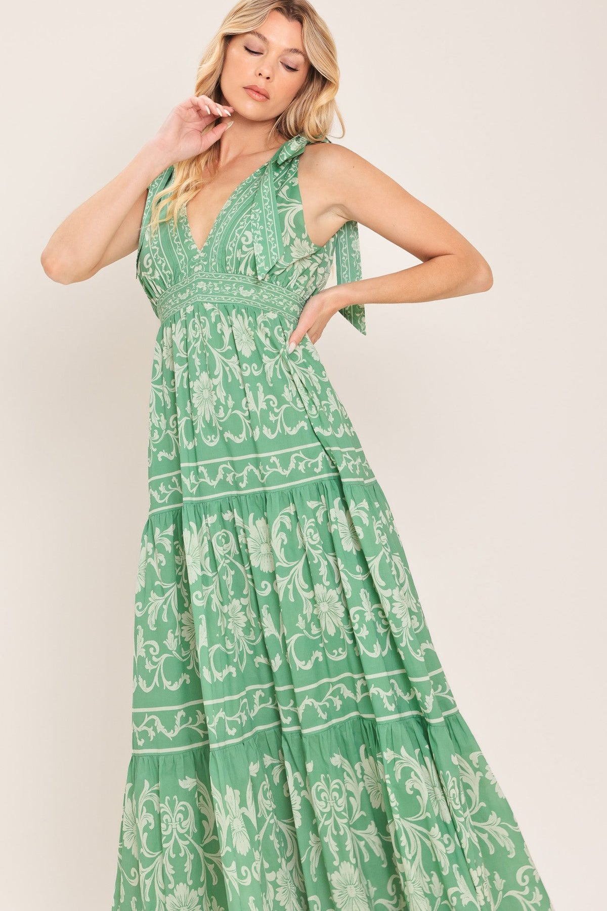 a woman in a green dress