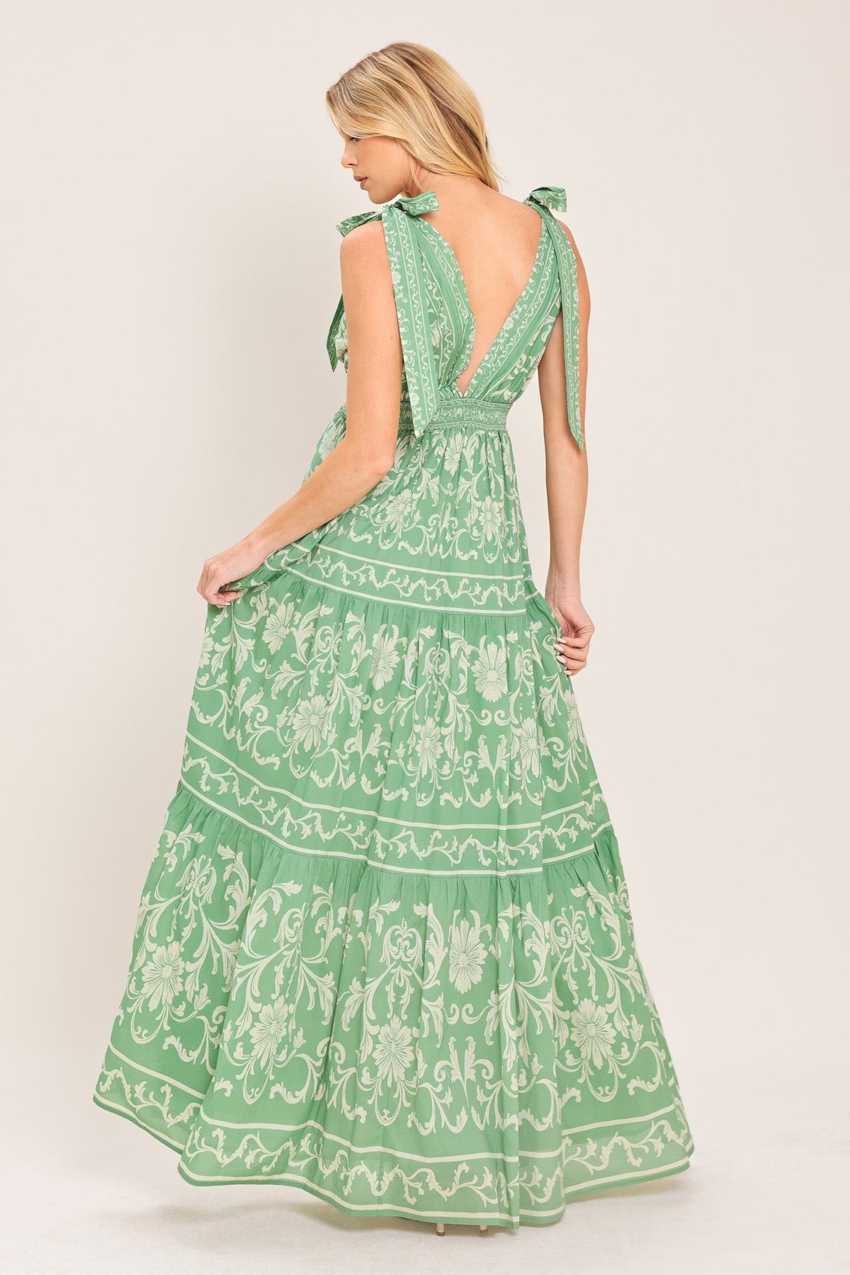a woman in a green dress