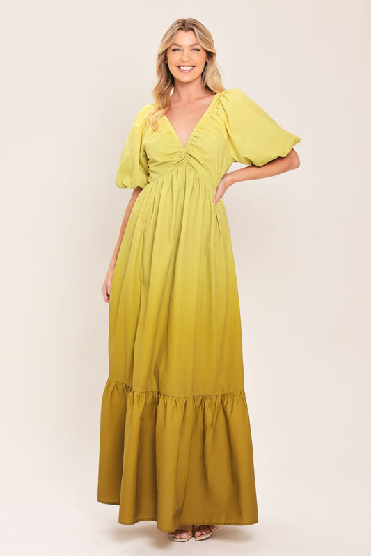 a woman in a yellow dress
