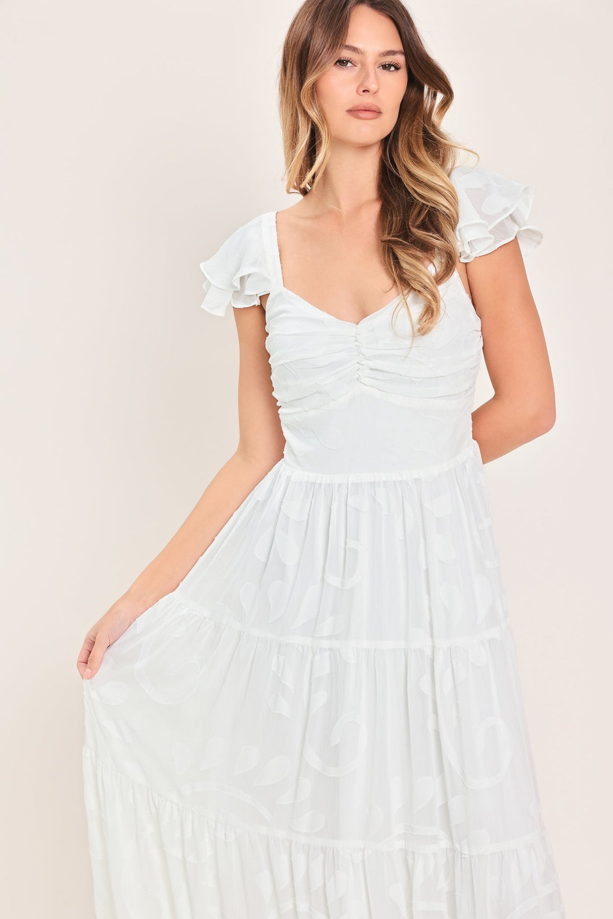 a woman in a white dress