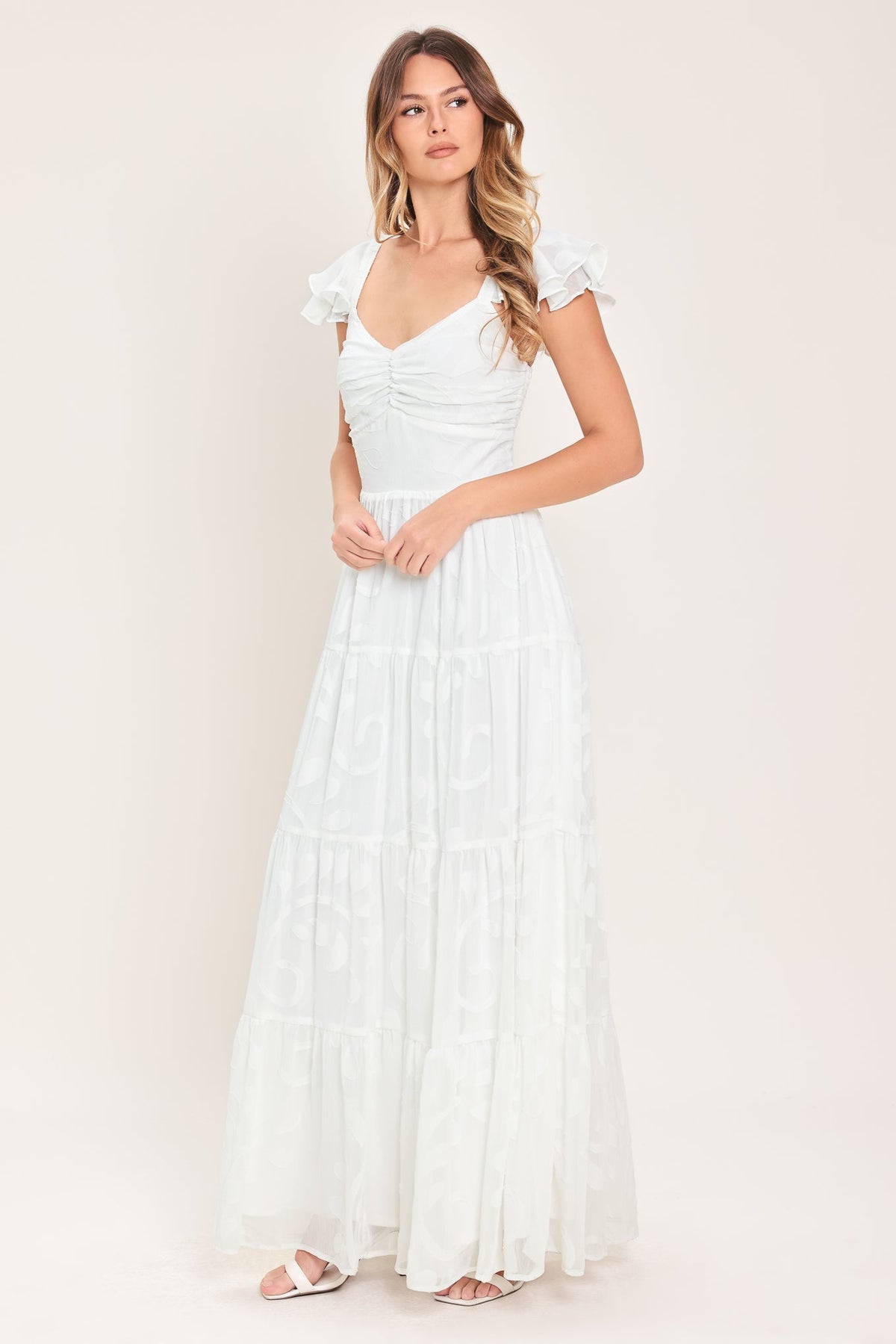 a woman in a white dress
