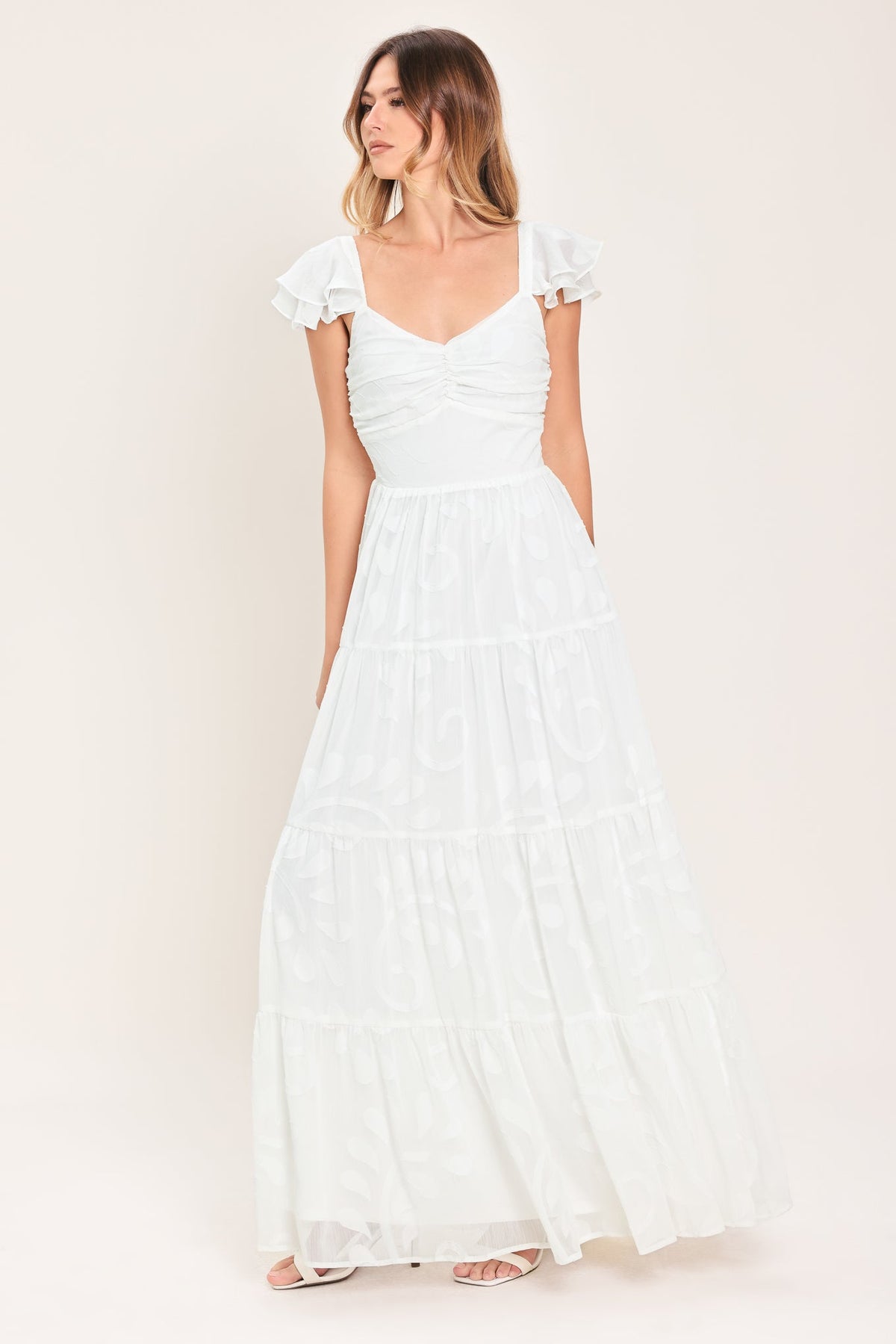 a woman in a white dress