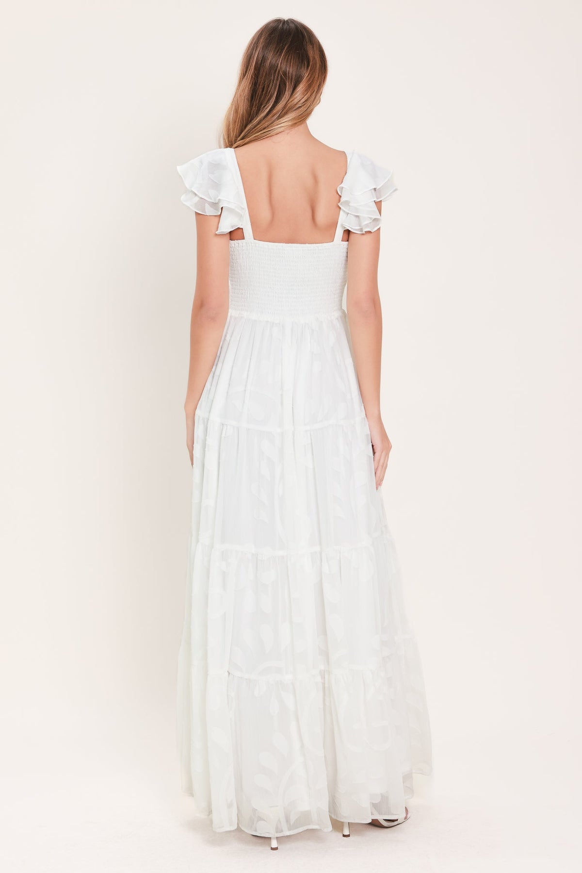 a woman in a white dress