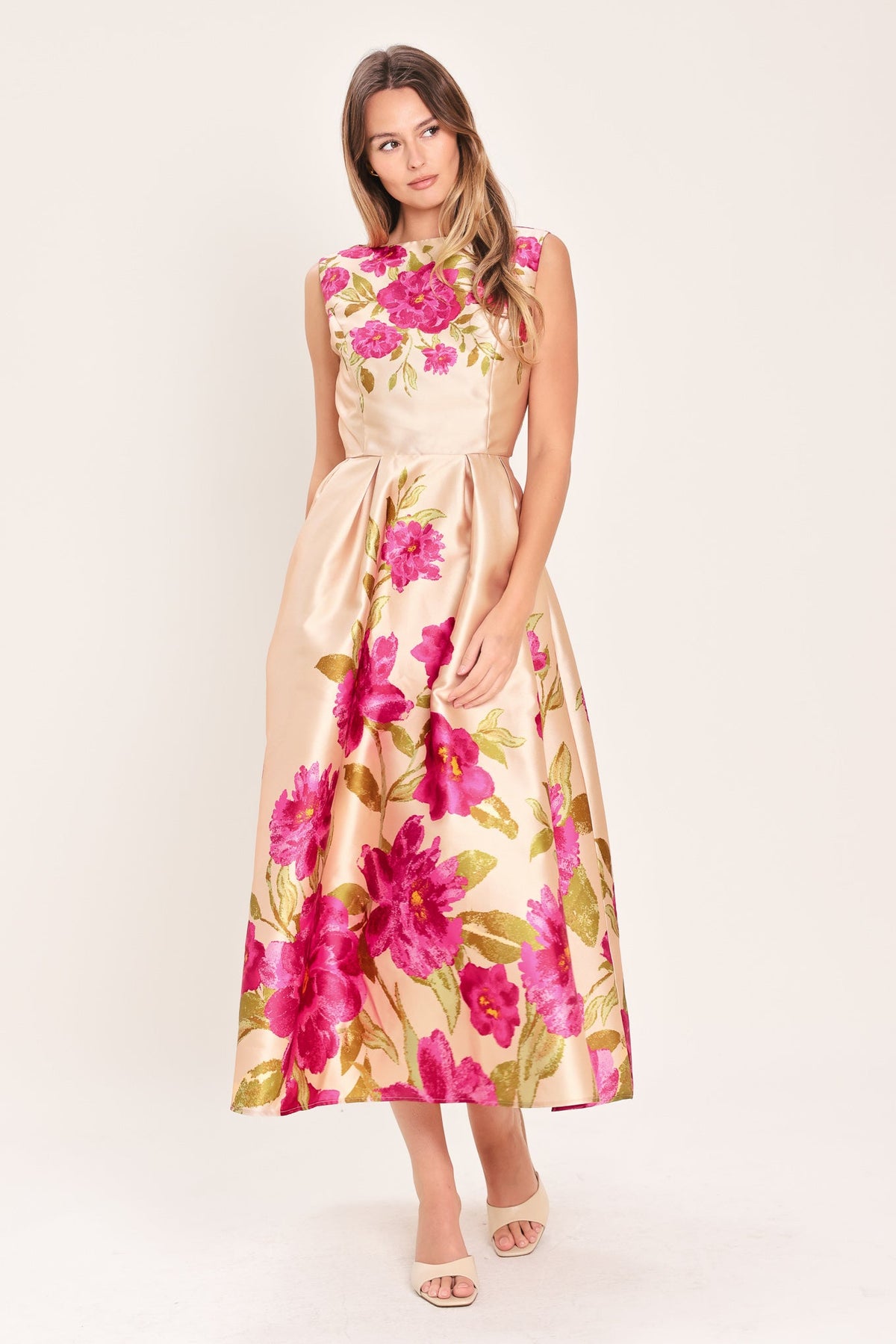a woman in a floral dress