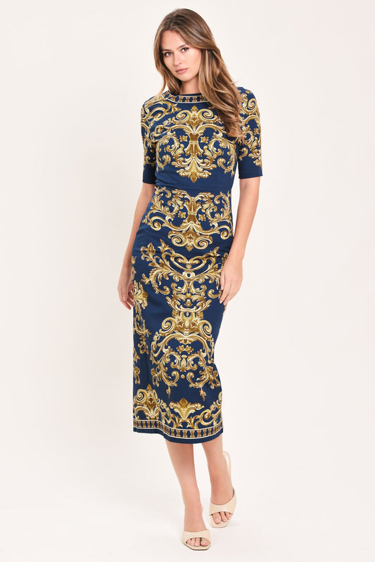 a woman in a blue and gold dress
