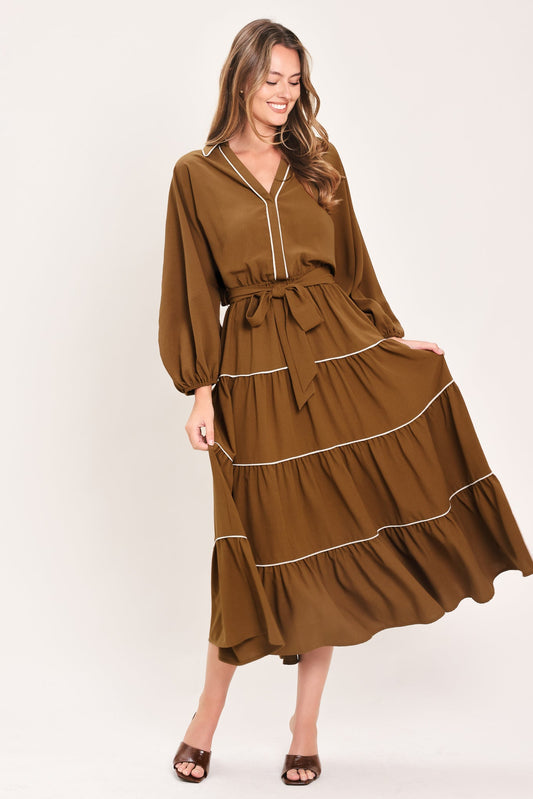 a woman in a brown dress