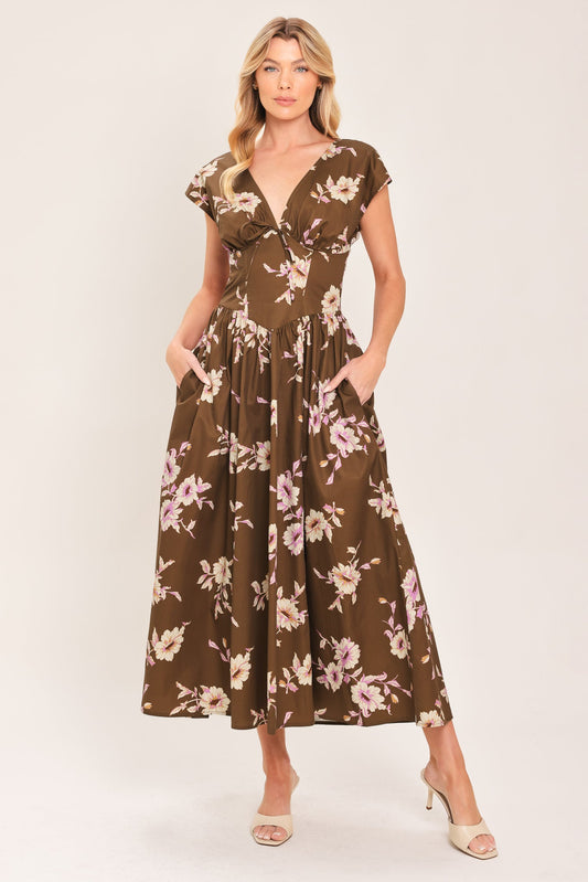 a woman in a brown dress