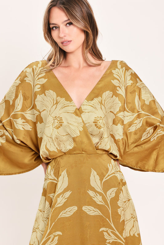 a woman in a yellow dress