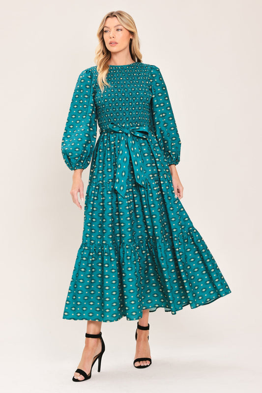 a woman in a green dress