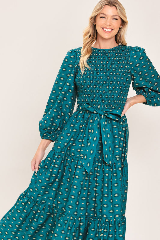 a woman in a green dress