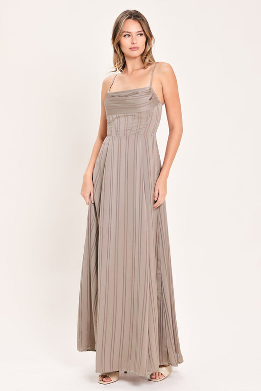 a woman in a long dress