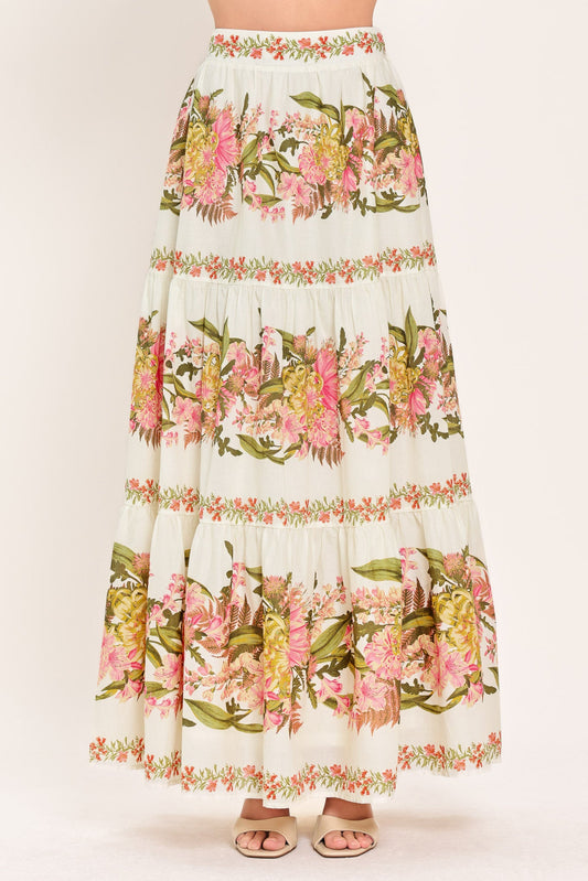 a white and pink floral skirt