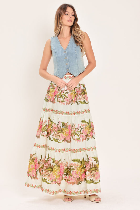 a woman in a floral skirt