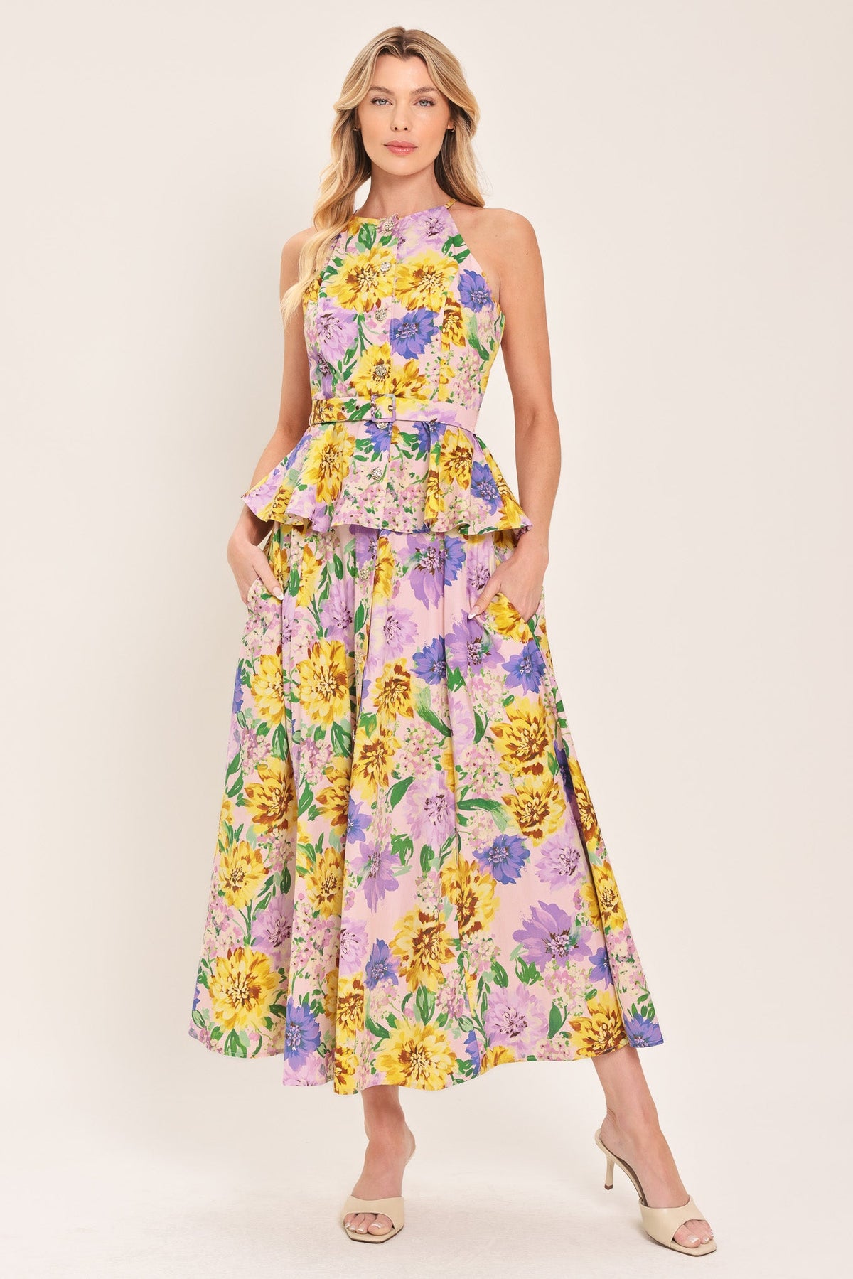 a woman in a floral dress