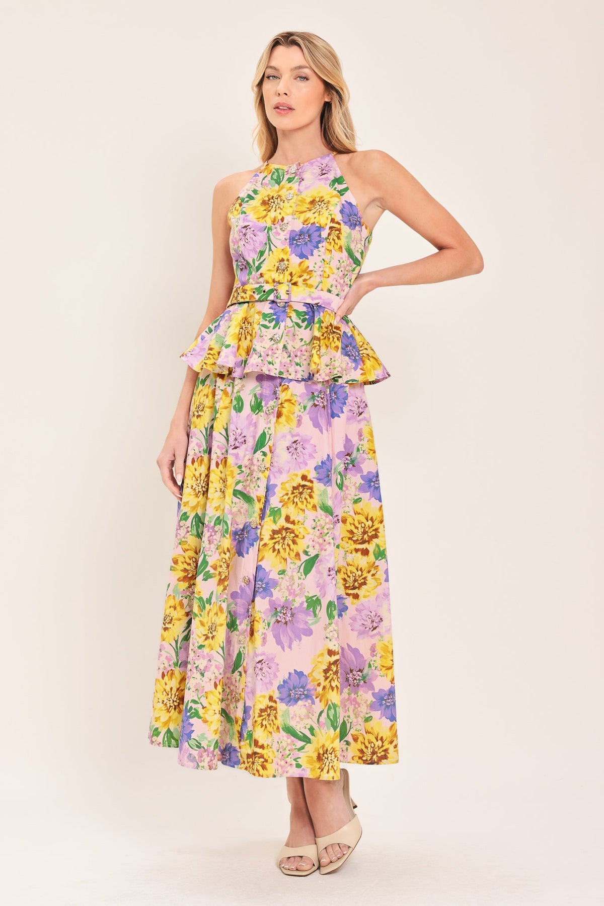 a woman in a floral dress