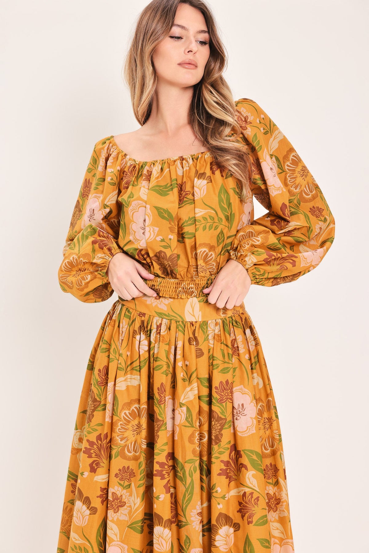 a woman in a yellow dress