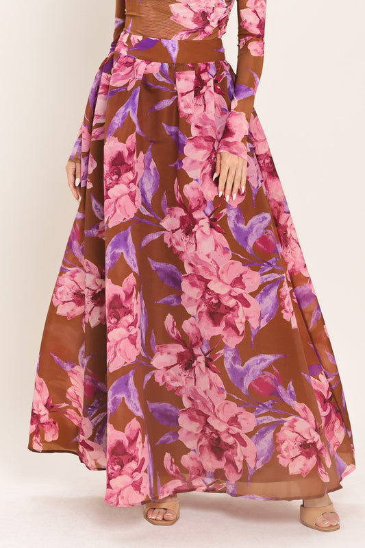 a woman wearing a floral dress