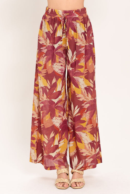 a person wearing a floral pants