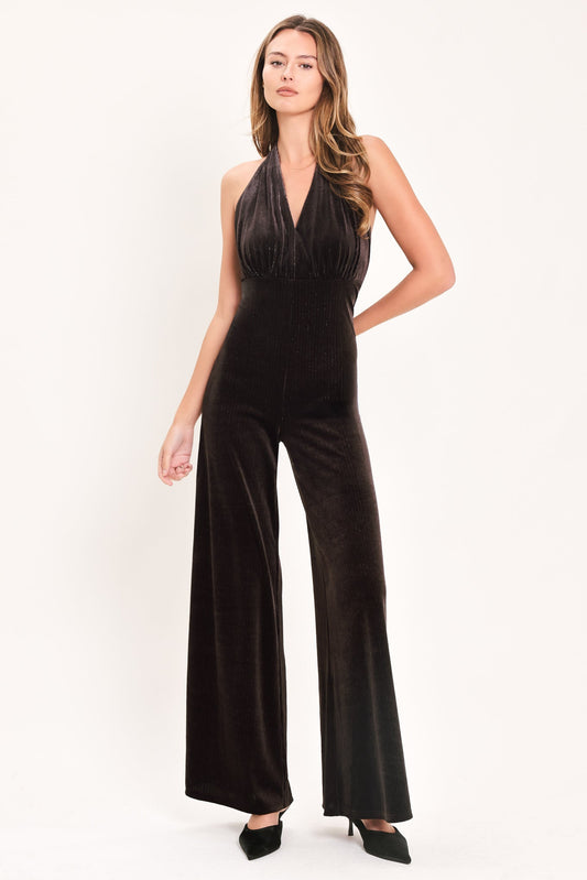a woman in a black jumpsuit