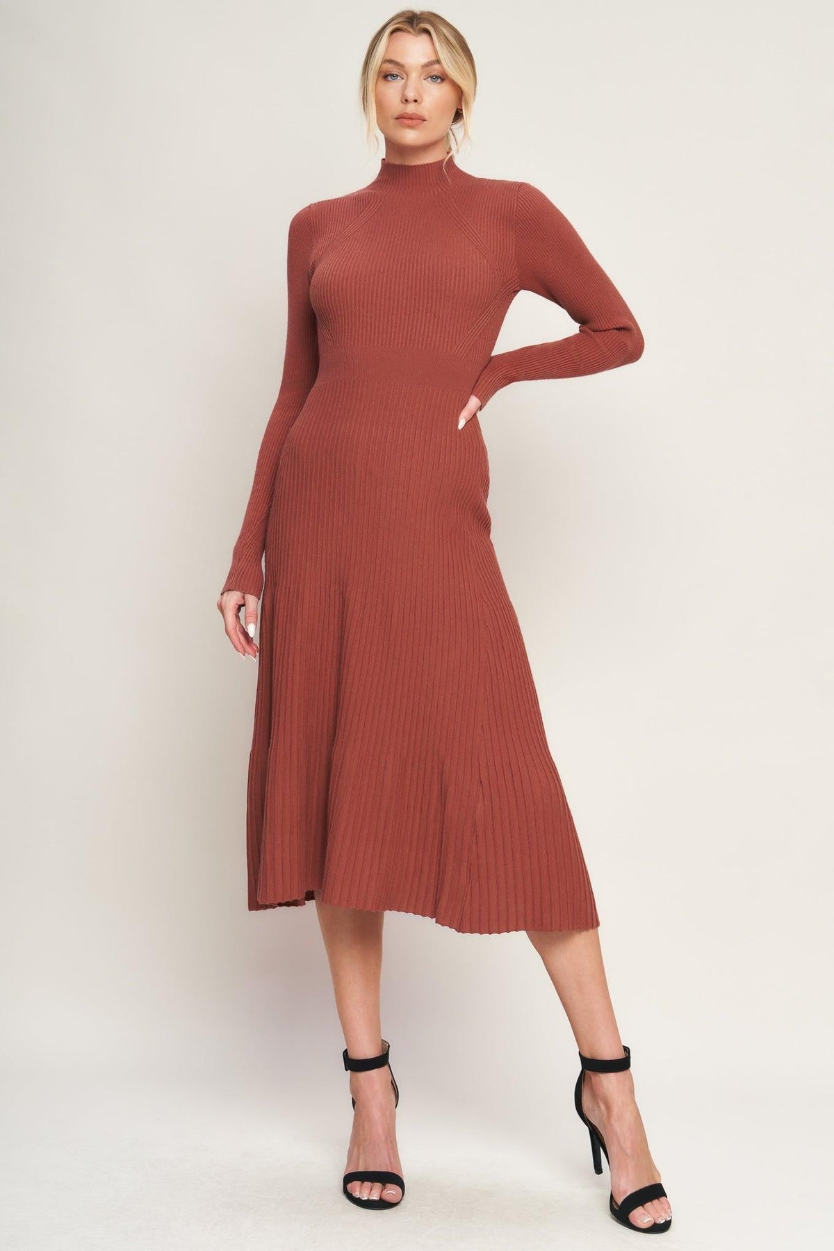 a woman in a brown dress