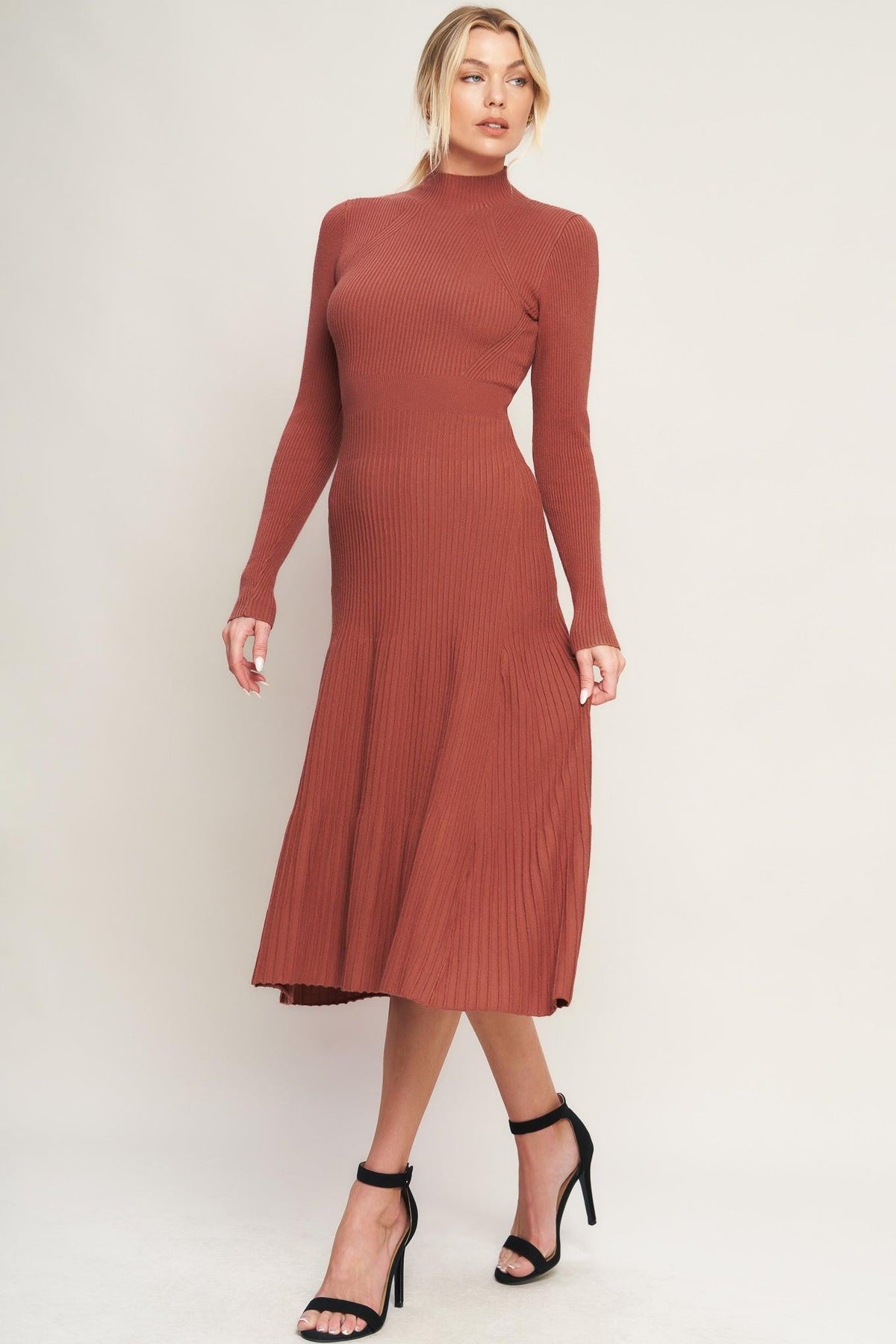 a woman in a long dress